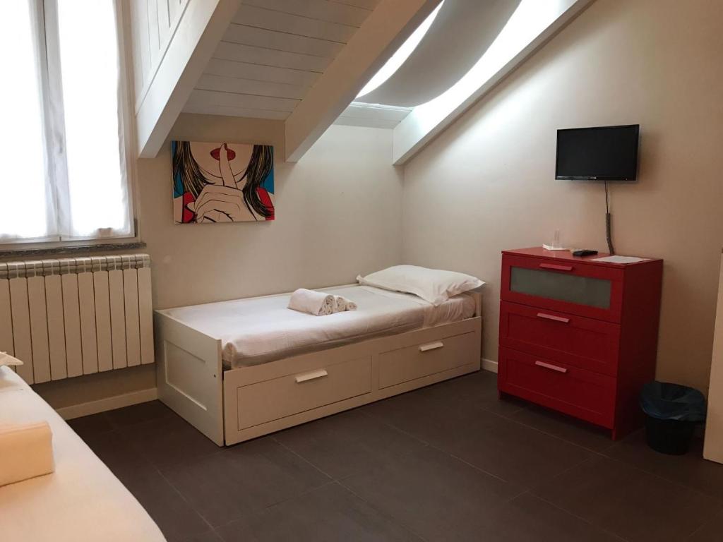 Postel nebo postele na pokoji v ubytování B&B Leonardo