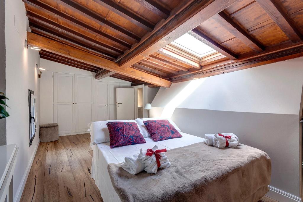 Posteľ alebo postele v izbe v ubytovaní Faenza Apartment by Mamo Florence