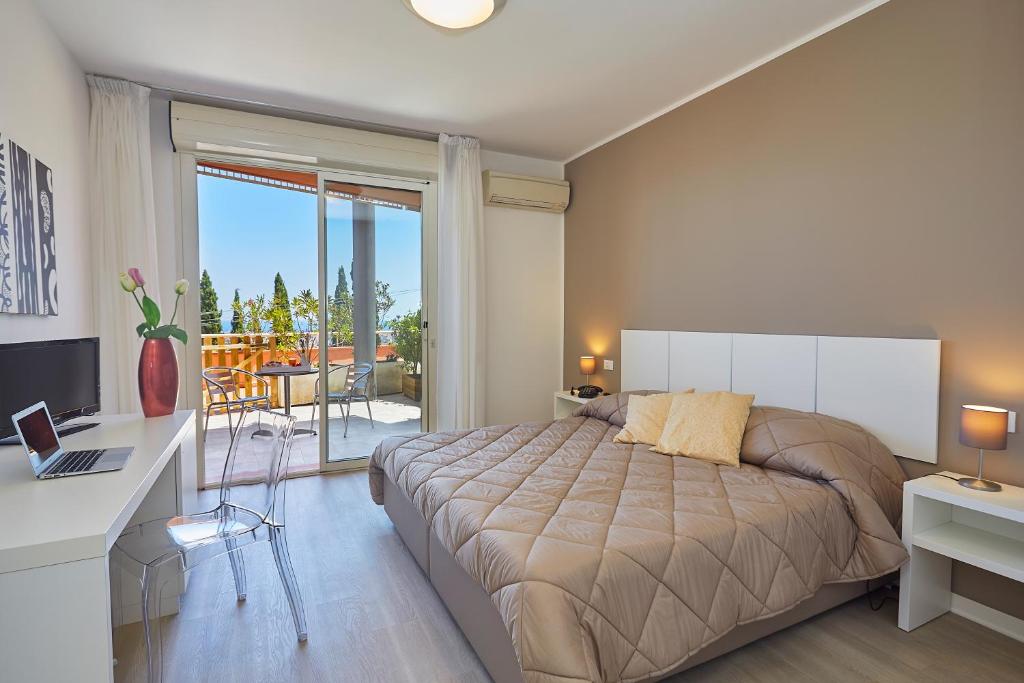 Postel nebo postele na pokoji v ubytování Hotel Bel 3