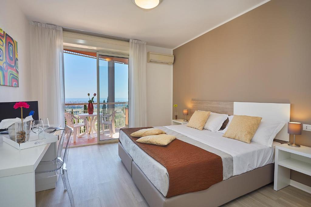 Postel nebo postele na pokoji v ubytování Hotel Bel 3