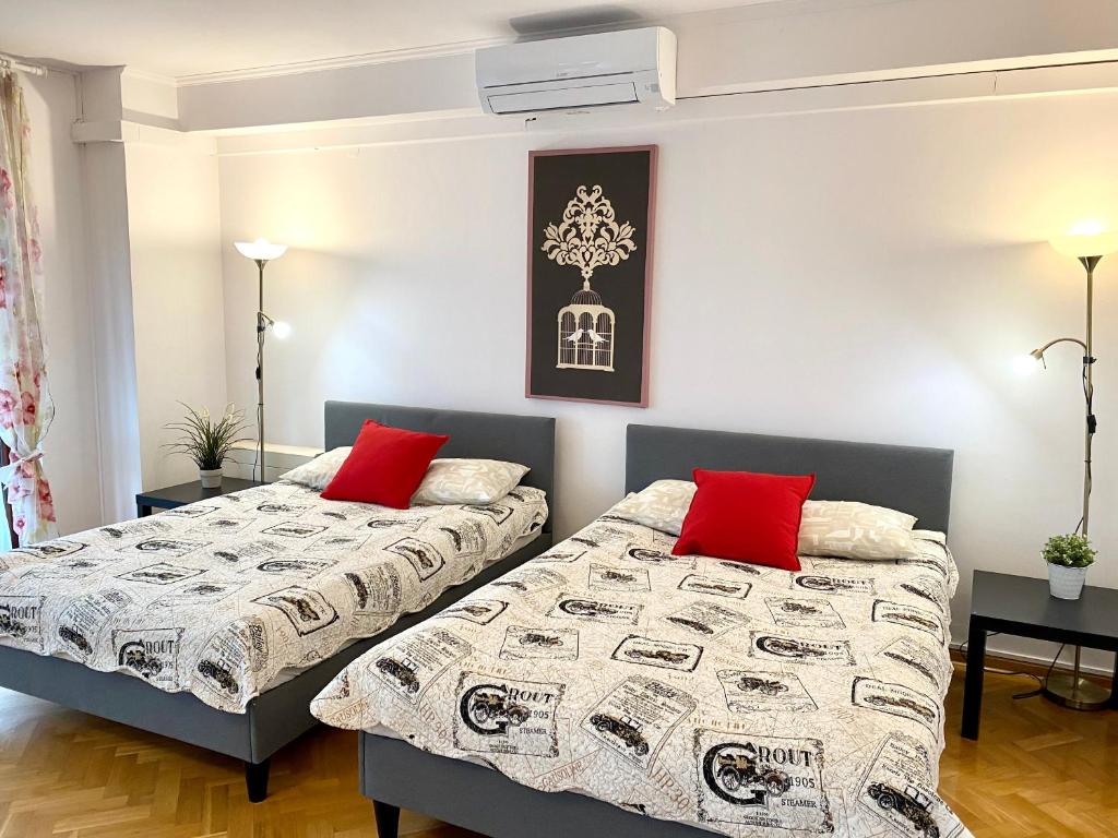 Posteľ alebo postele v izbe v ubytovaní Center Warsaw - Apartmenty Jana Pawła II