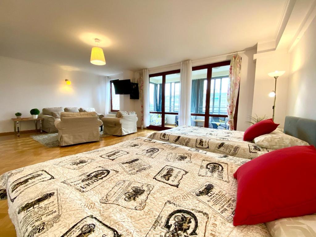 Posteľ alebo postele v izbe v ubytovaní Center Warsaw - Apartmenty Jana Pawła II