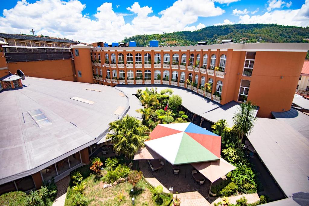 an overhead view of a building with an umbrella at Zomatel Hotel in Fianarantsoa