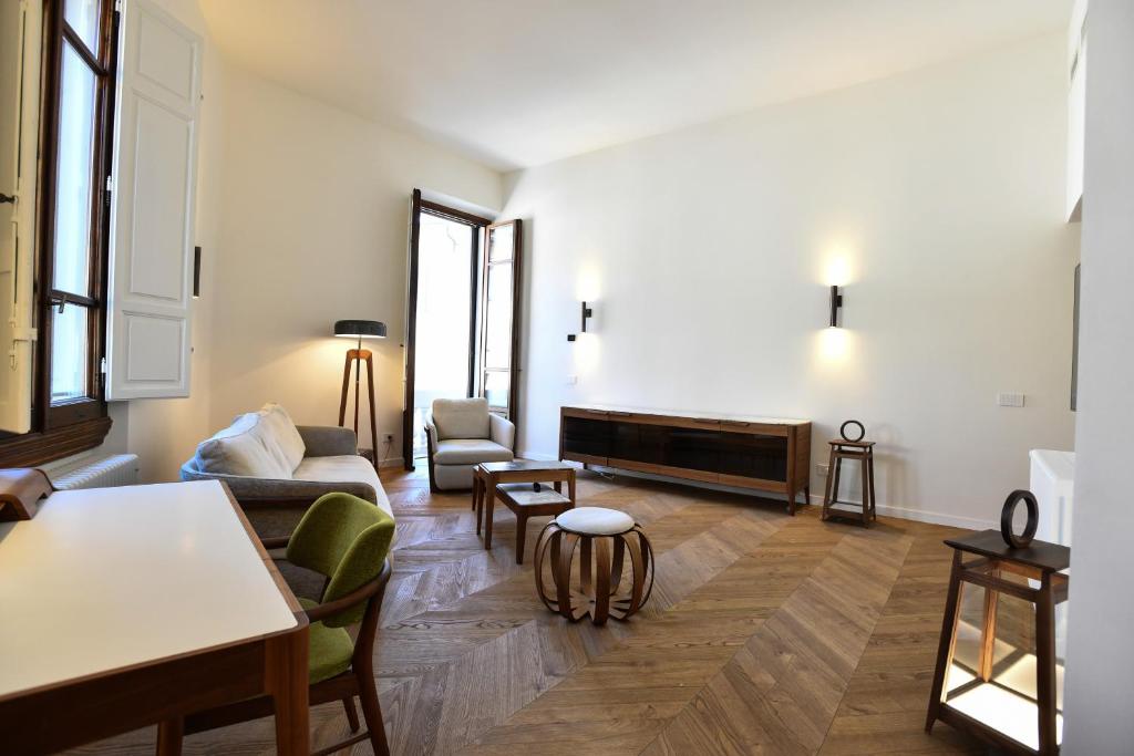 A seating area at Cappelle Medicee Luxury Flat