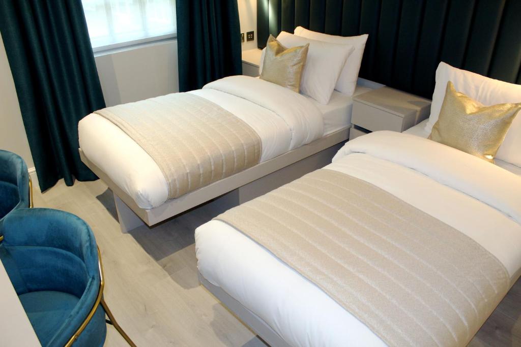 Letto o letti in una camera di NOX Waterloo