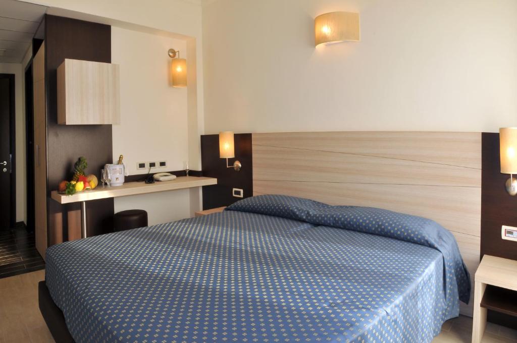 Posteľ alebo postele v izbe v ubytovaní Morcavallo Hotel & Wellness