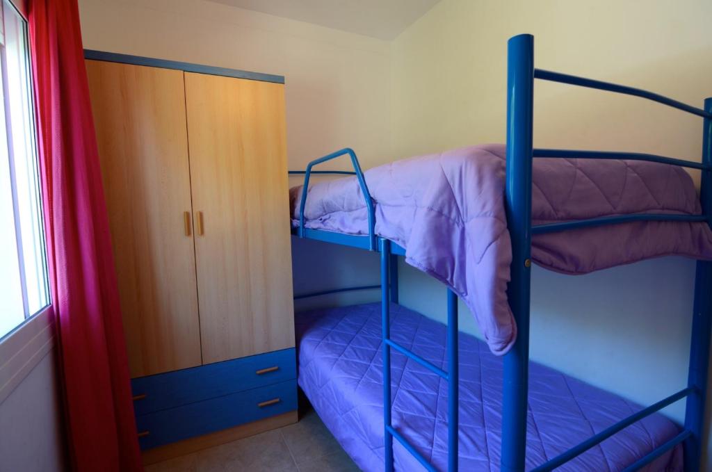 Posteľ alebo postele v izbe v ubytovaní Fluvia 32 A