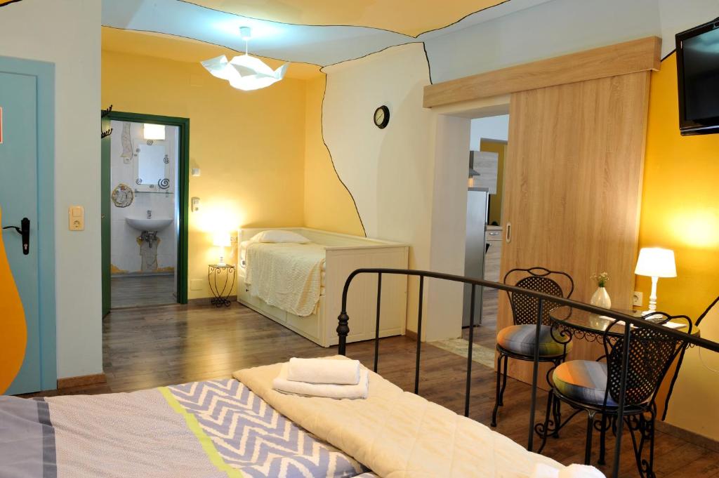 Postel nebo postele na pokoji v ubytování Gostilna in Prenočišča Brančurnik