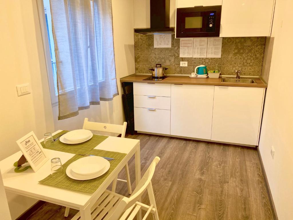 Kuchyňa alebo kuchynka v ubytovaní Mimì Rooms&Studios