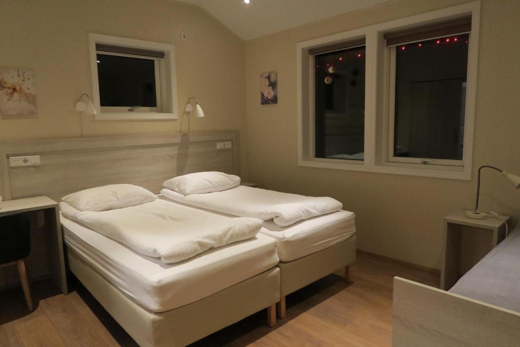 Postel nebo postele na pokoji v ubytování Dilksnes Guesthouse