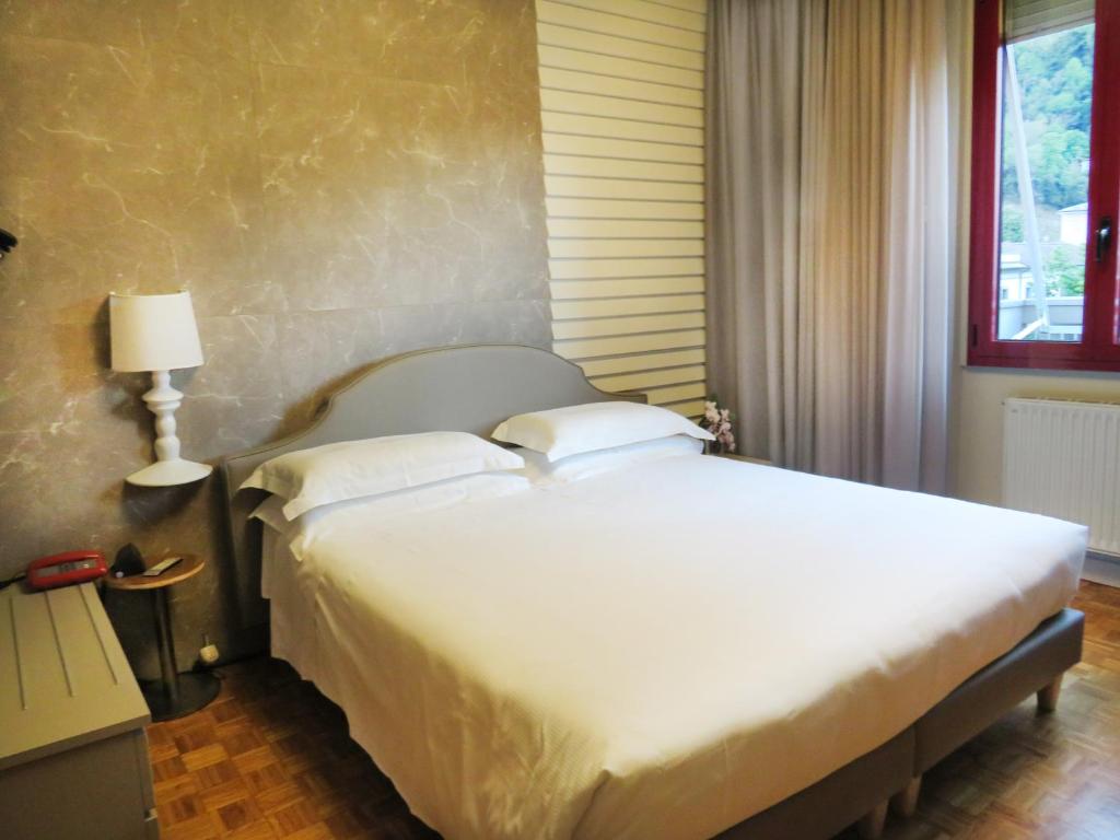 Postel nebo postele na pokoji v ubytování Park Hotel Meublé