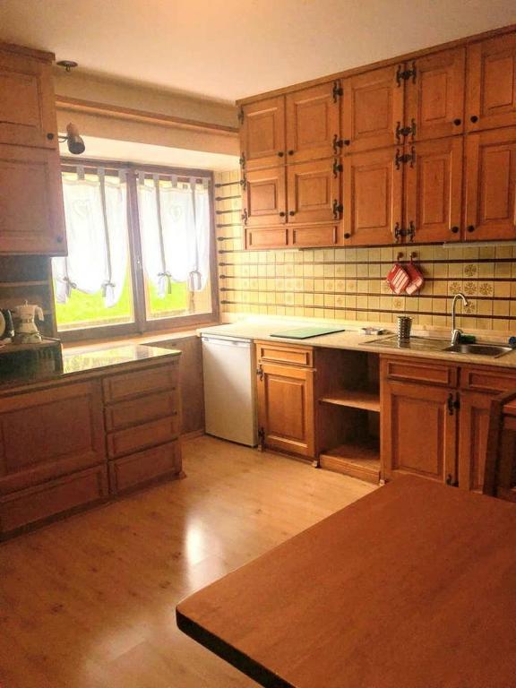Kuchyň nebo kuchyňský kout v ubytování CASA VACANZE MIRAMONTI - appartamento con balcone con vista sulle Dolomiti