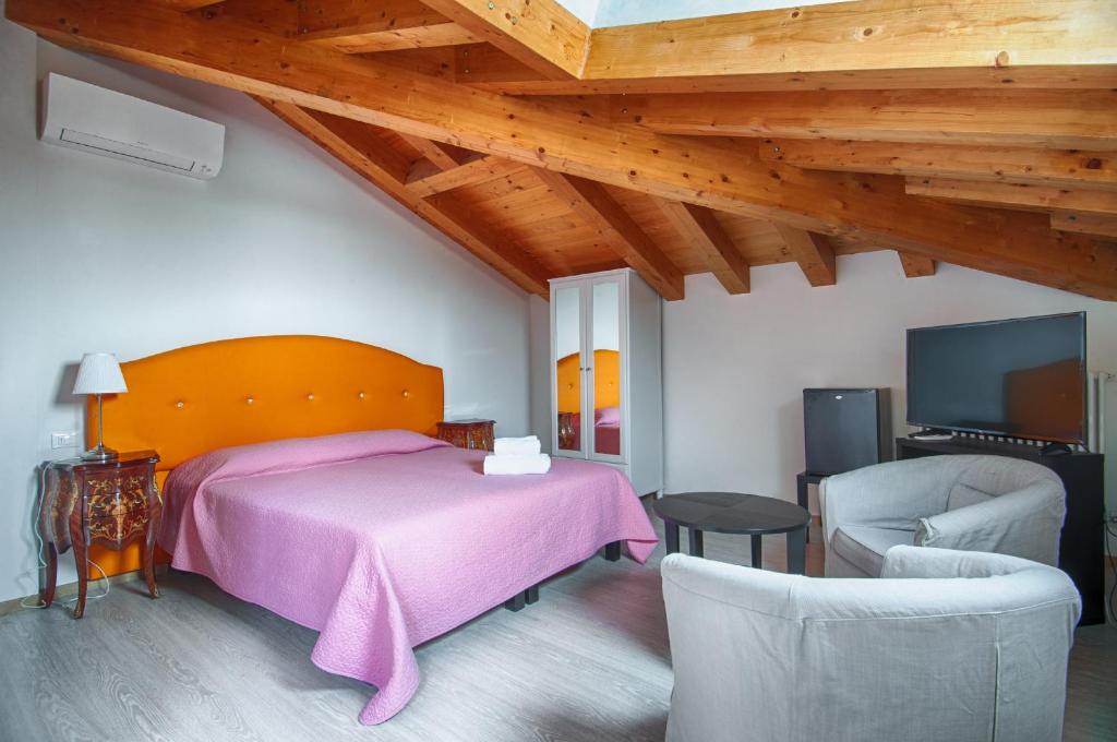 Postel nebo postele na pokoji v ubytování Lady Verona Residence
