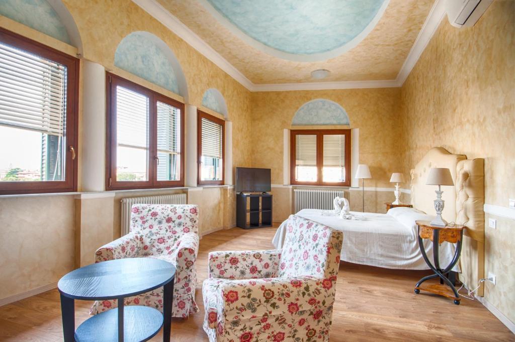 Postel nebo postele na pokoji v ubytování Lady Verona Residence