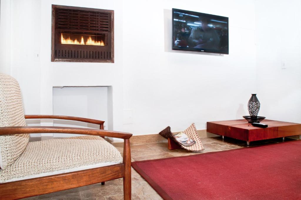 TV a/nebo společenská místnost v ubytování Hotel Casona Usaquen