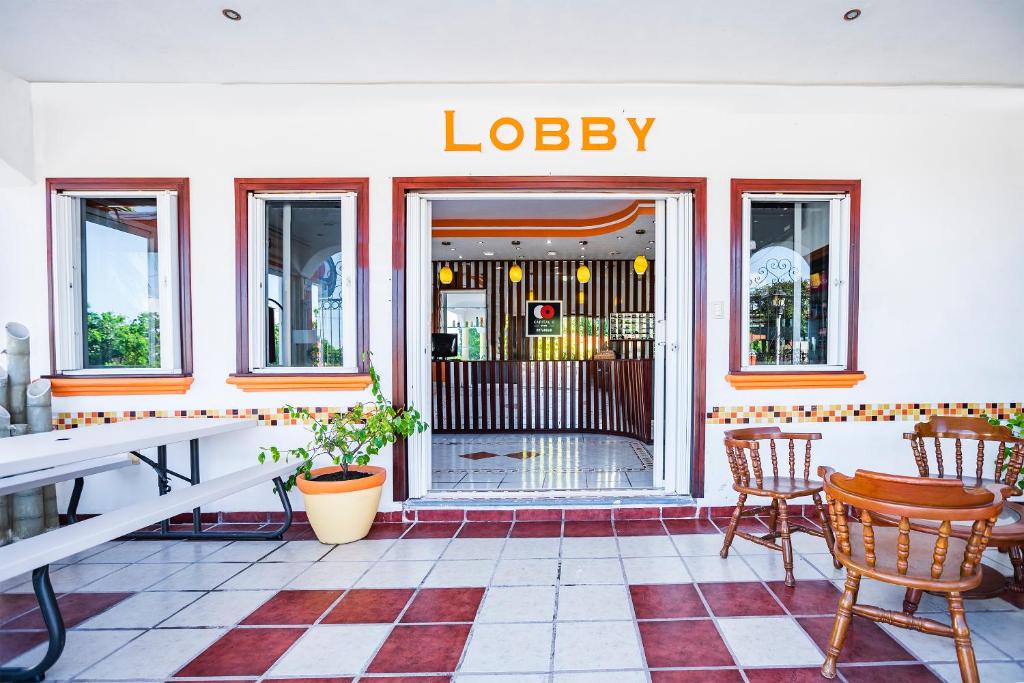Restaurace v ubytování Capital O Oxtankah,chetumal bay