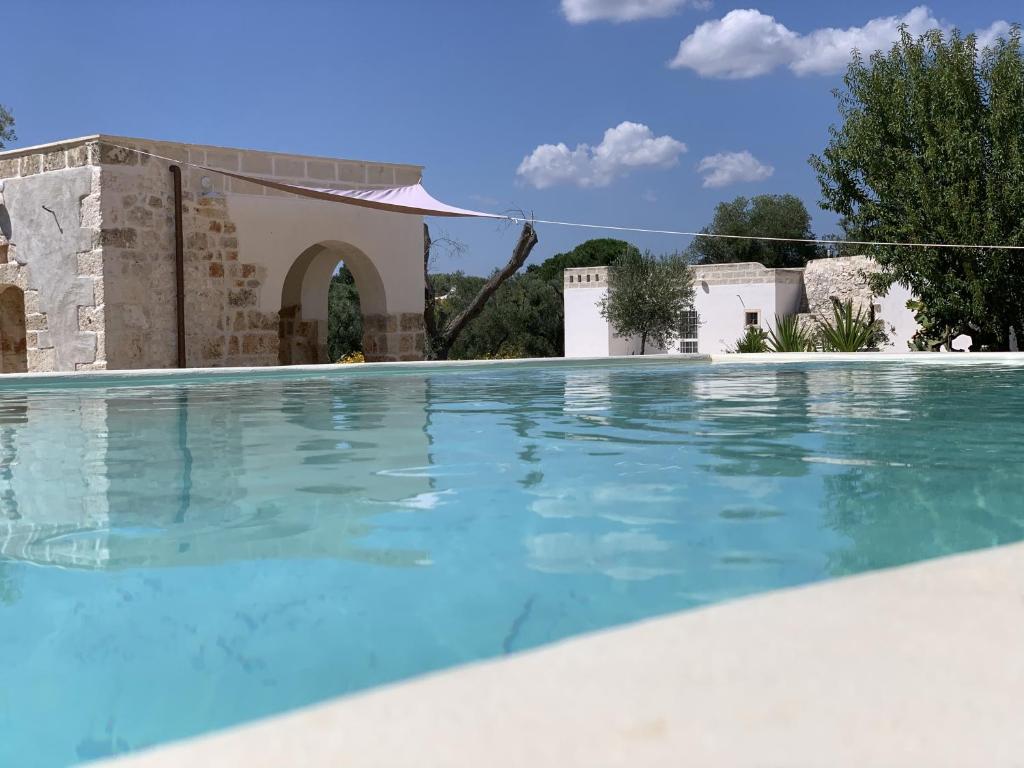 een zwembad voor een villa bij The Paradise - Il Paradiso di Ostuni in Ostuni