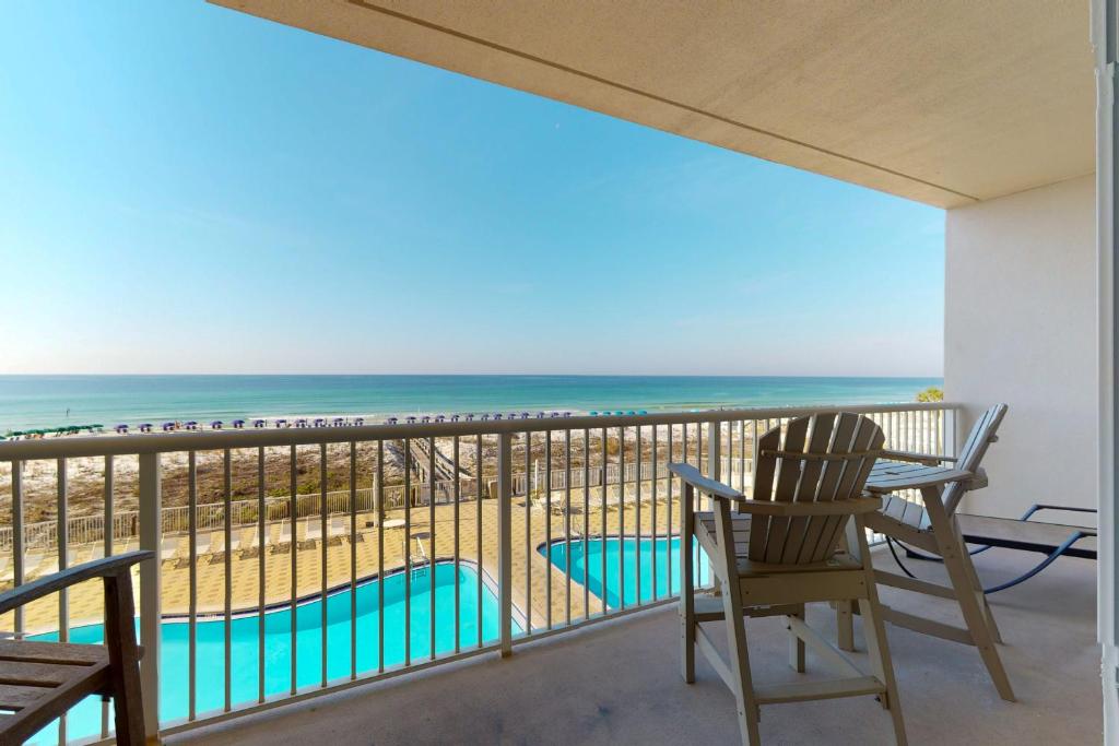 a balcony with a view of the beach at Summer Place in Fort Walton Beach