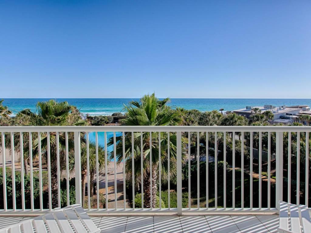 a balcony with a view of the beach and the ocean at Crescent III in Destin