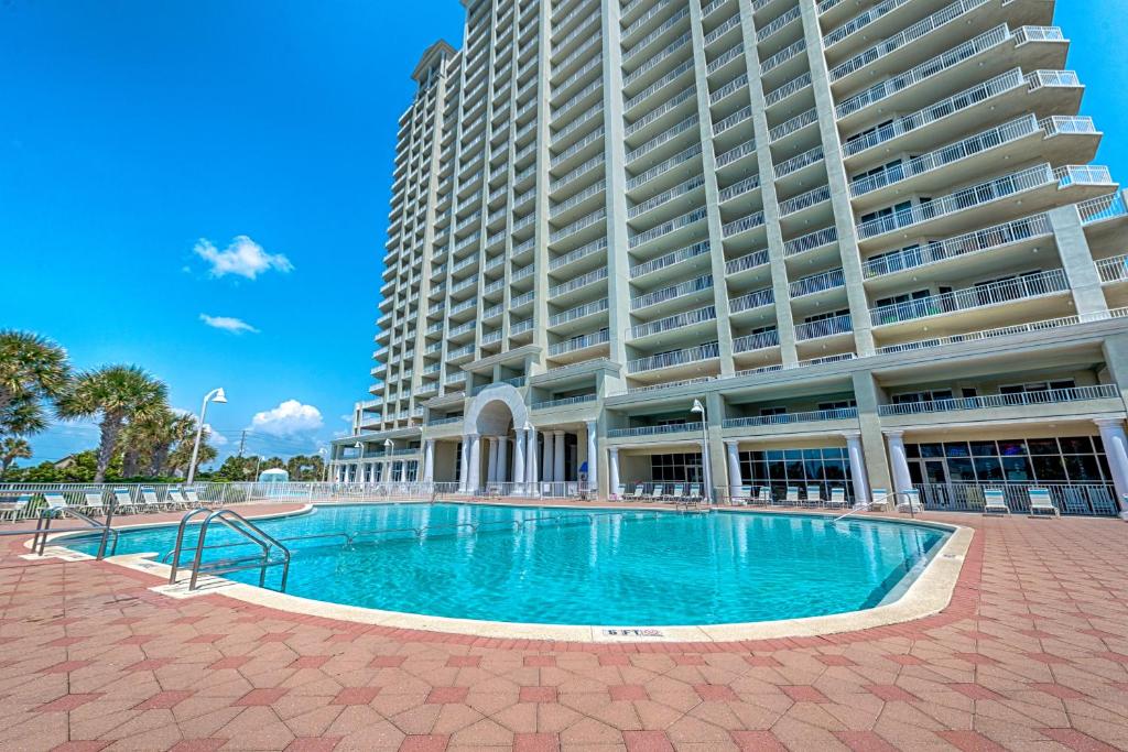 a large apartment building with a large swimming pool at Ariel Dunes II in Destin