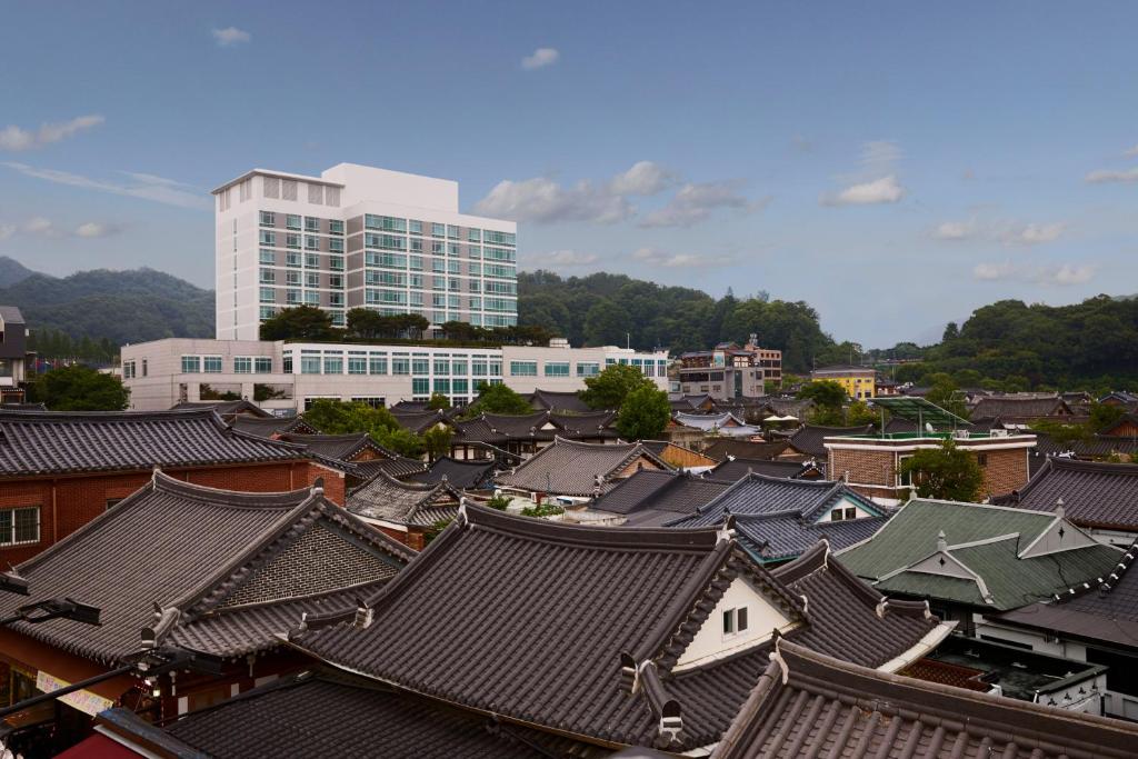an overhead view of a city with buildings and roofs at Lahan Hotel Jeonju in Jeonju