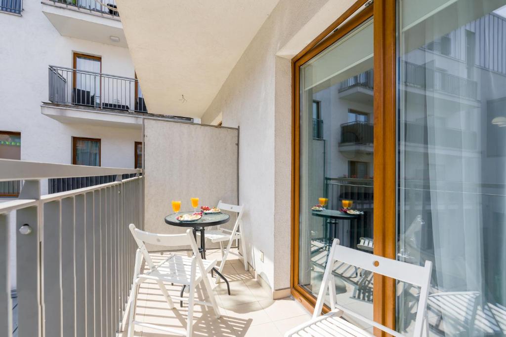 Balkón alebo terasa v ubytovaní Sleepway Apartments- Garbary 100-46
