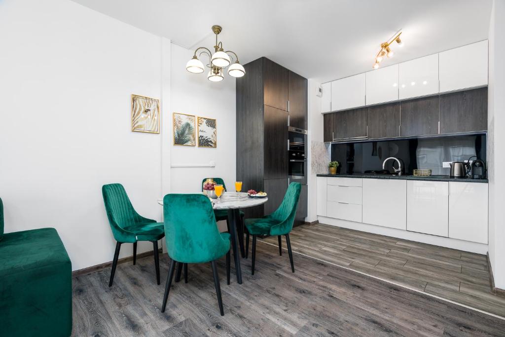 Kuchyňa alebo kuchynka v ubytovaní Sleepway Apartments- Garbary 100-46