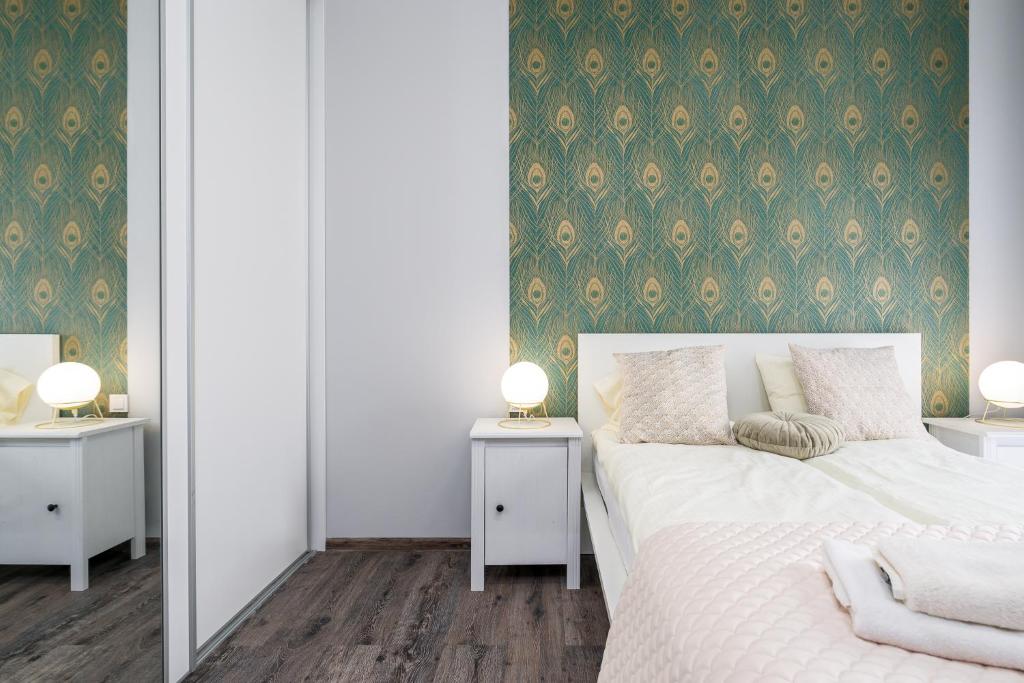 Posteľ alebo postele v izbe v ubytovaní Sleepway Apartments- Garbary 100-46