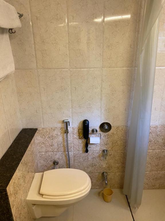Koupelna v ubytování Panchavati Elite Inn