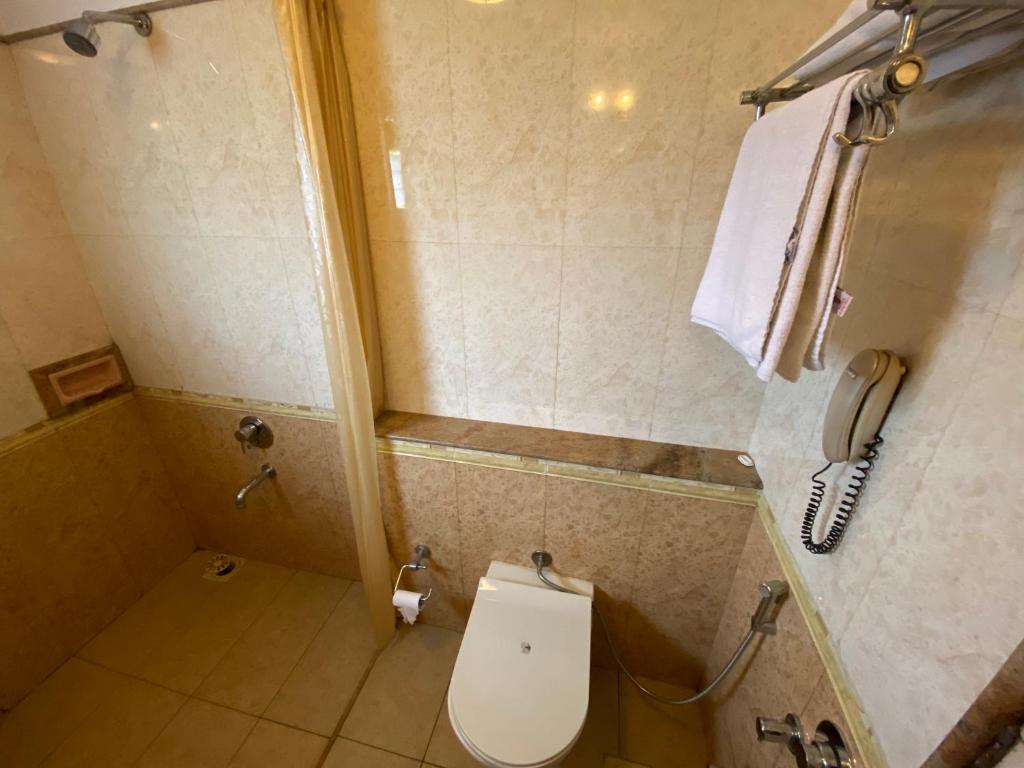 Koupelna v ubytování Panchavati Elite Inn