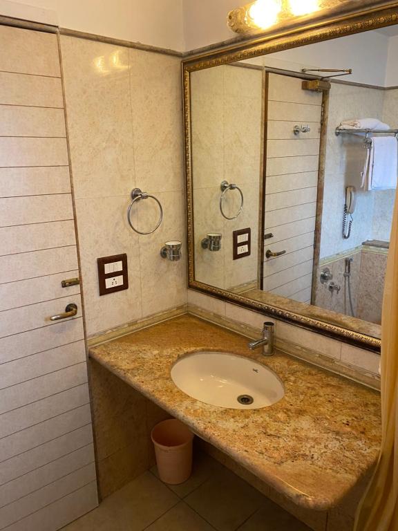 Koupelna v ubytování Panchavati Elite Inn