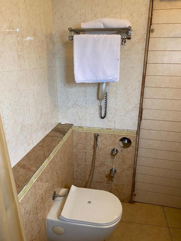 Koupelna v ubytování Panchavati Elite Inn