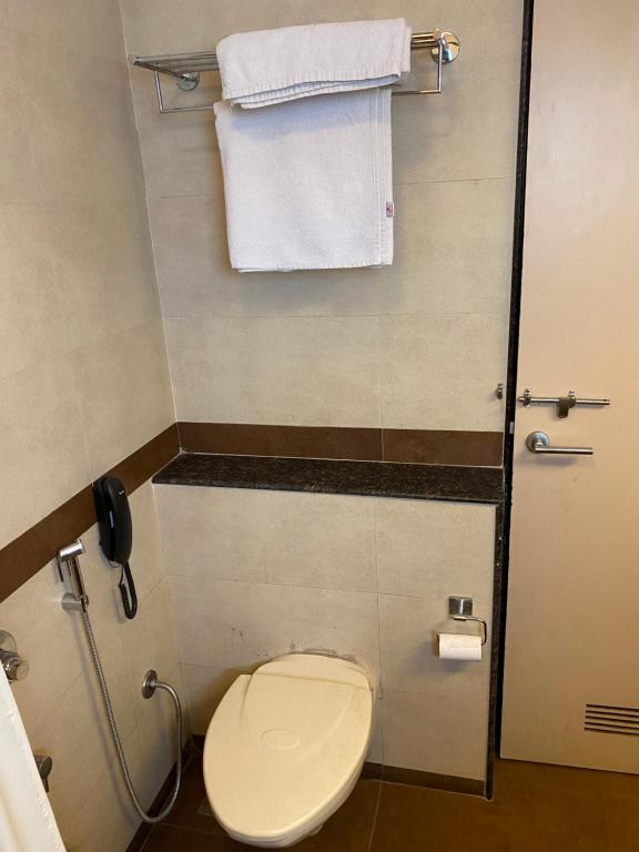 Koupelna v ubytování Panchavati Elite Inn