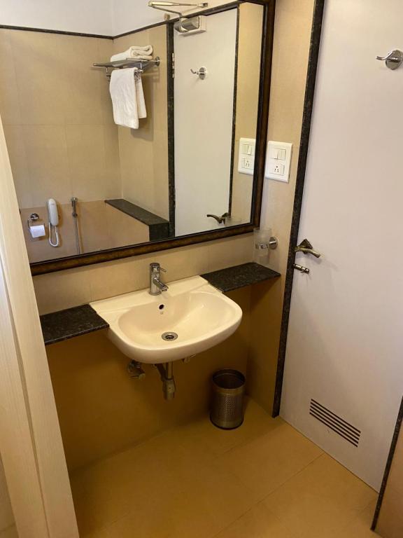 Koupelna v ubytování Panchavati Elite Inn