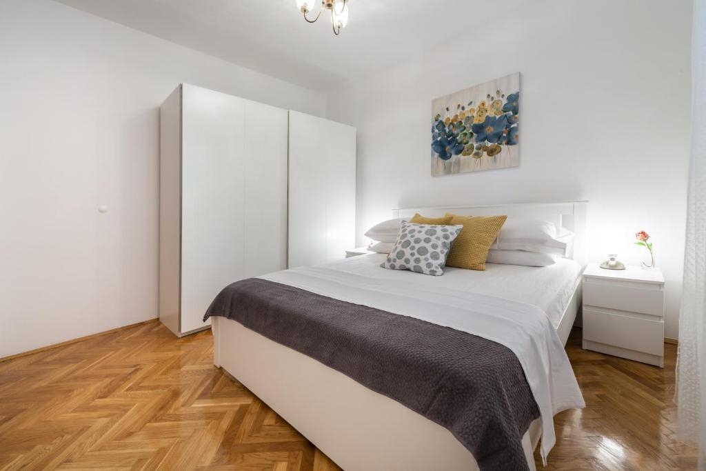 Posteľ alebo postele v izbe v ubytovaní Guest House Riverside