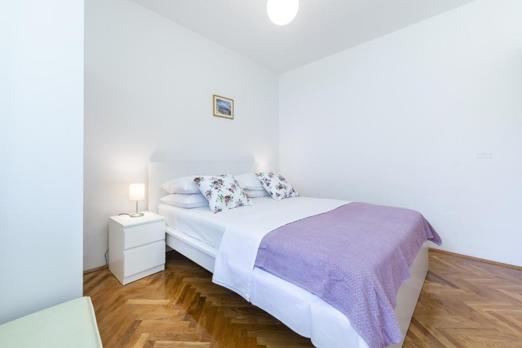 Posteľ alebo postele v izbe v ubytovaní Guest House Riverside