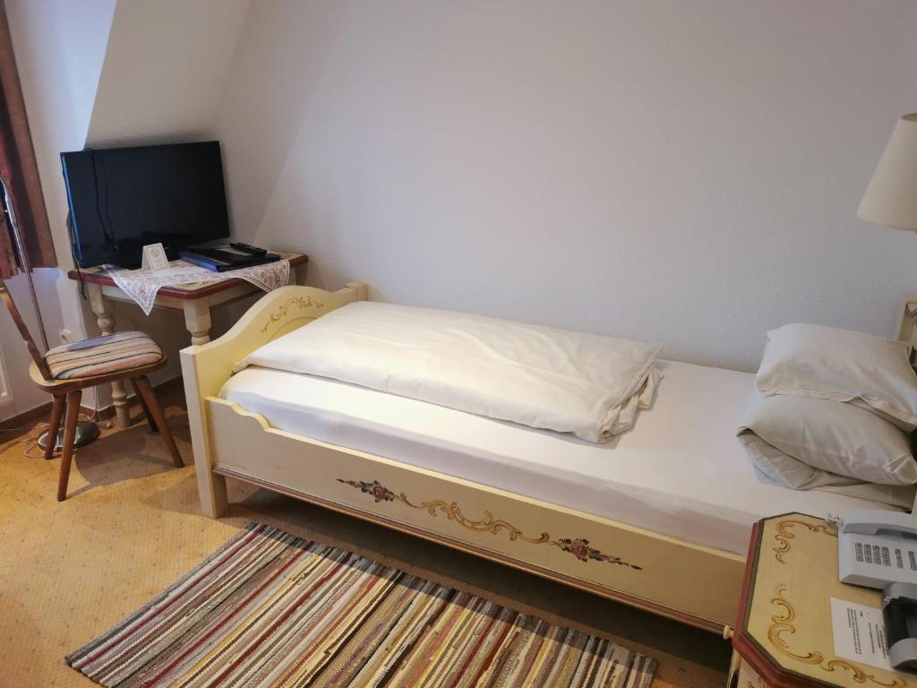 Postel nebo postele na pokoji v ubytování Tilman Riemenschneider