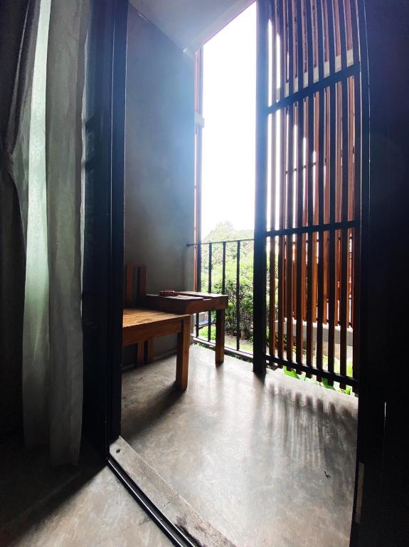 Lamphu House Chiang Mai - SHA Extra Plus Certified - Standard Corner Double Room With Partial Pool View