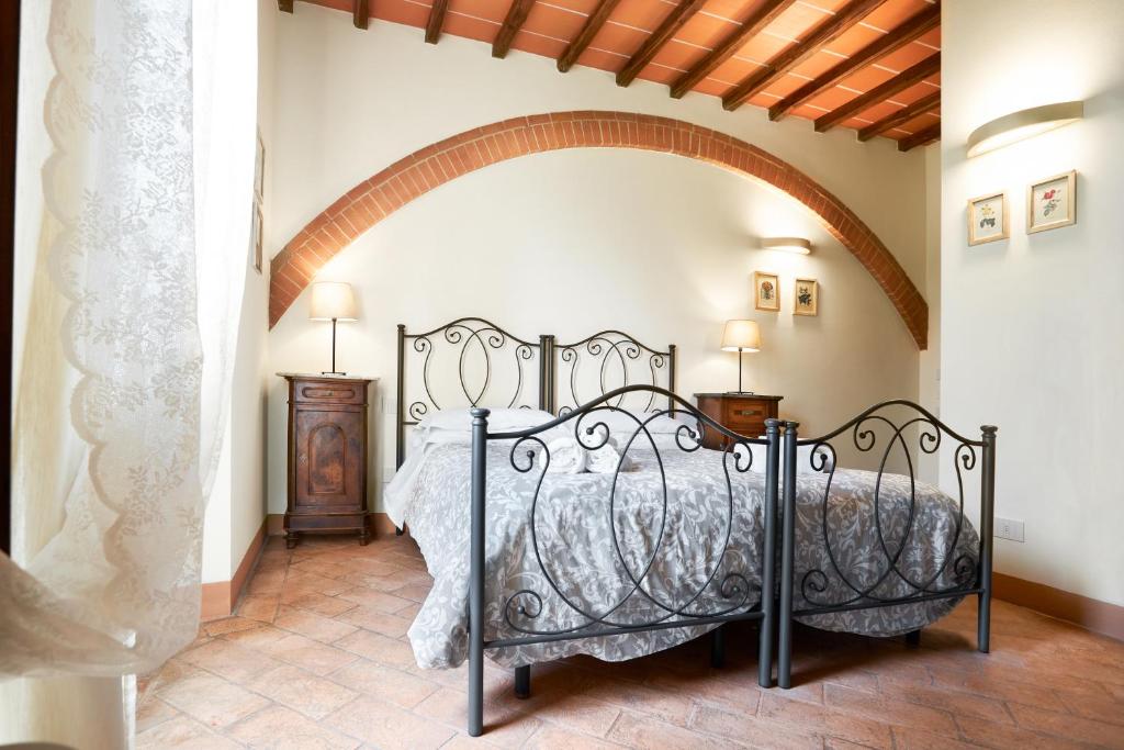 Postel nebo postele na pokoji v ubytování Agriturismo Podere Casato