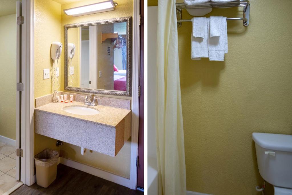 Um banheiro em Woodridge Inn and Suites