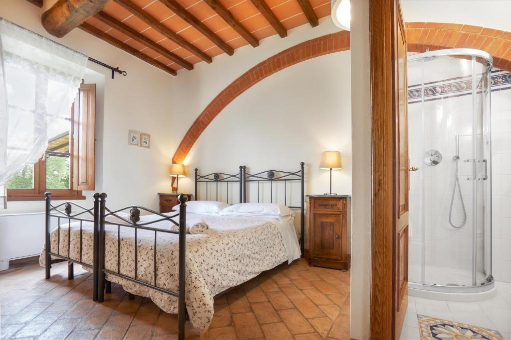 Postel nebo postele na pokoji v ubytování Agriturismo Podere Casato