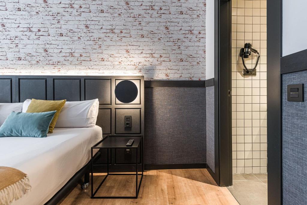 Postel nebo postele na pokoji v ubytování BYPILLOW San Mamés
