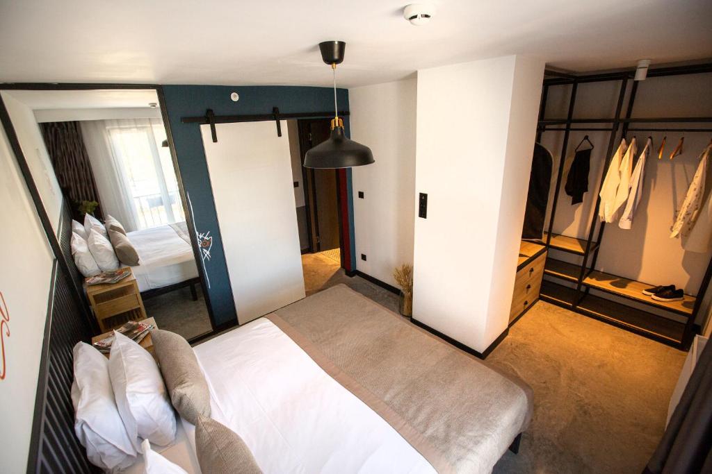 Postel nebo postele na pokoji v ubytování Cityloft 64