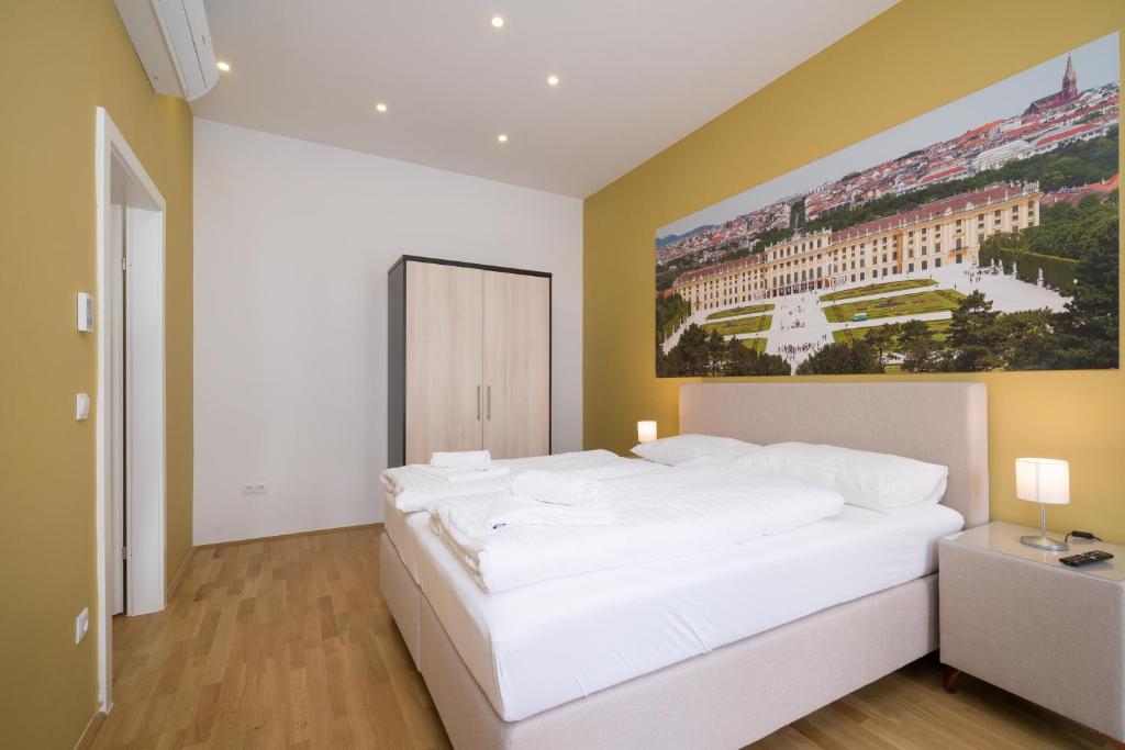 Postel nebo postele na pokoji v ubytování Vienna Stay Apartments or Rooms 1050