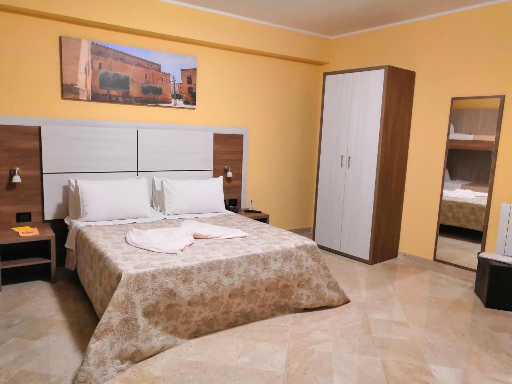 Posteľ alebo postele v izbe v ubytovaní Fratelli Clemente Spa and Hotel