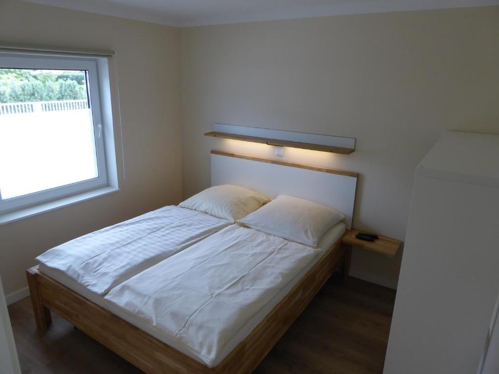 Postel nebo postele na pokoji v ubytování Haus Arendsee