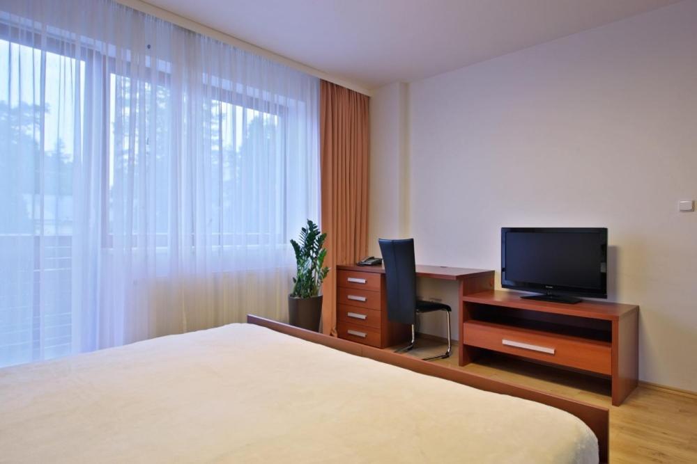 TV a/nebo společenská místnost v ubytování Apartmány Čeladná