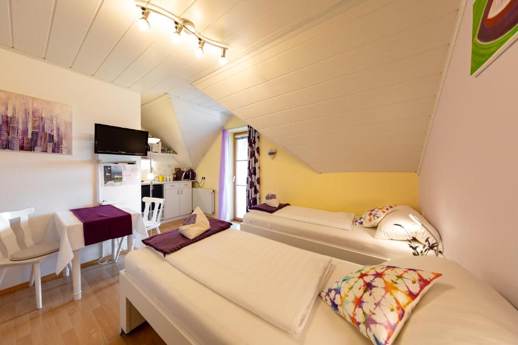 Postel nebo postele na pokoji v ubytování Privatzimmer Haus Gschweitl