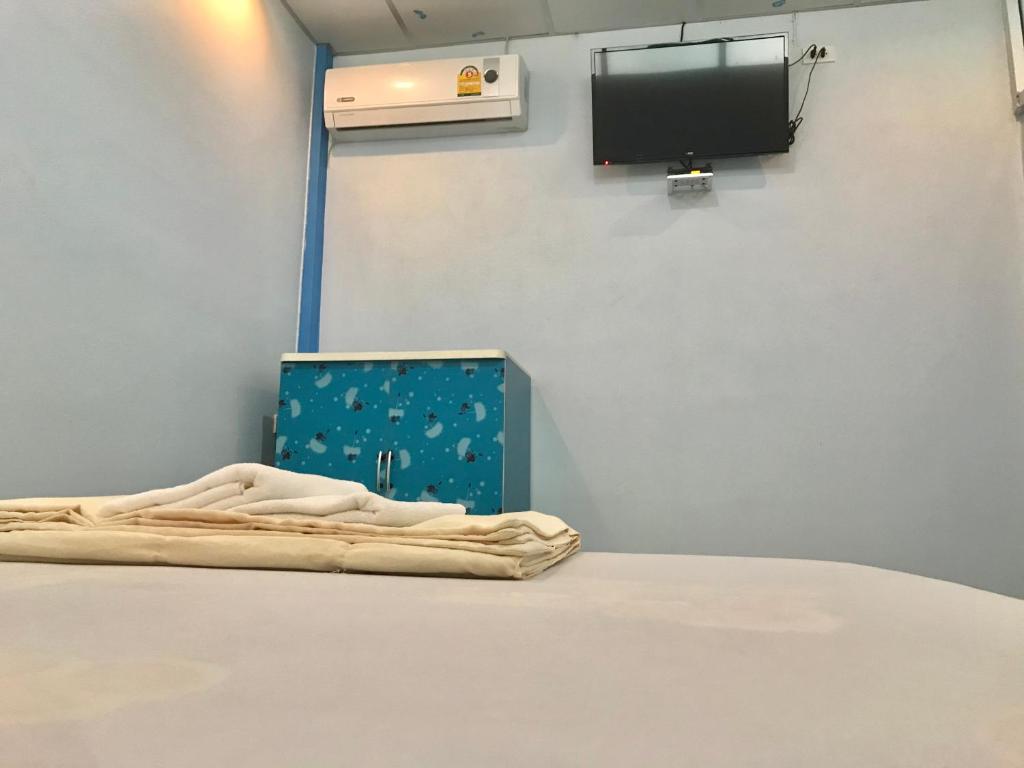 Postel nebo postele na pokoji v ubytování Tanarod Gueshouse