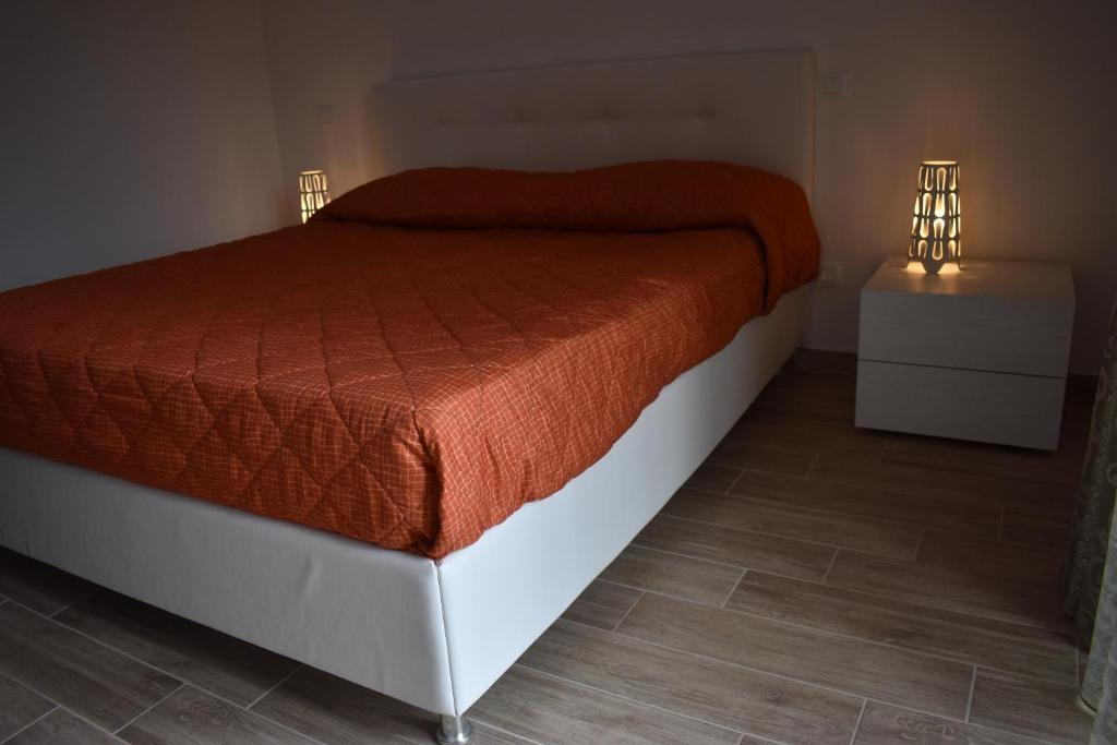 Postel nebo postele na pokoji v ubytování Da Clara e Raffaele